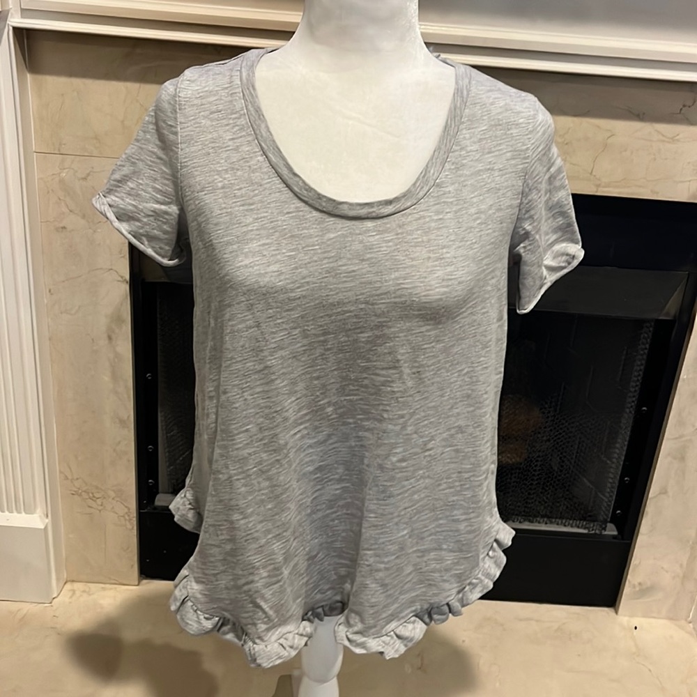 Gray size L.  Fits like a S or XS. Ruffle detail. Never worn. Listing #1454